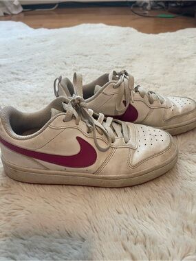 Nike Women’s White Sneakers with Pink Swoosh
